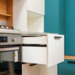 The Slow Way to Clear Out a Cabinet - Less in the House